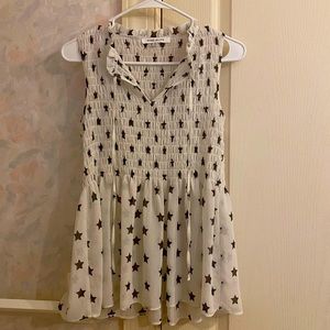 🛍Sleeveless black stars on white blouse size XS👚